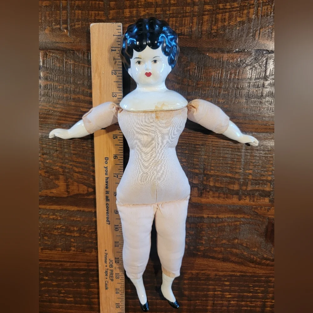 Beautiful Vintage China Head Doll rare brown eyes & pale face 15in‎
